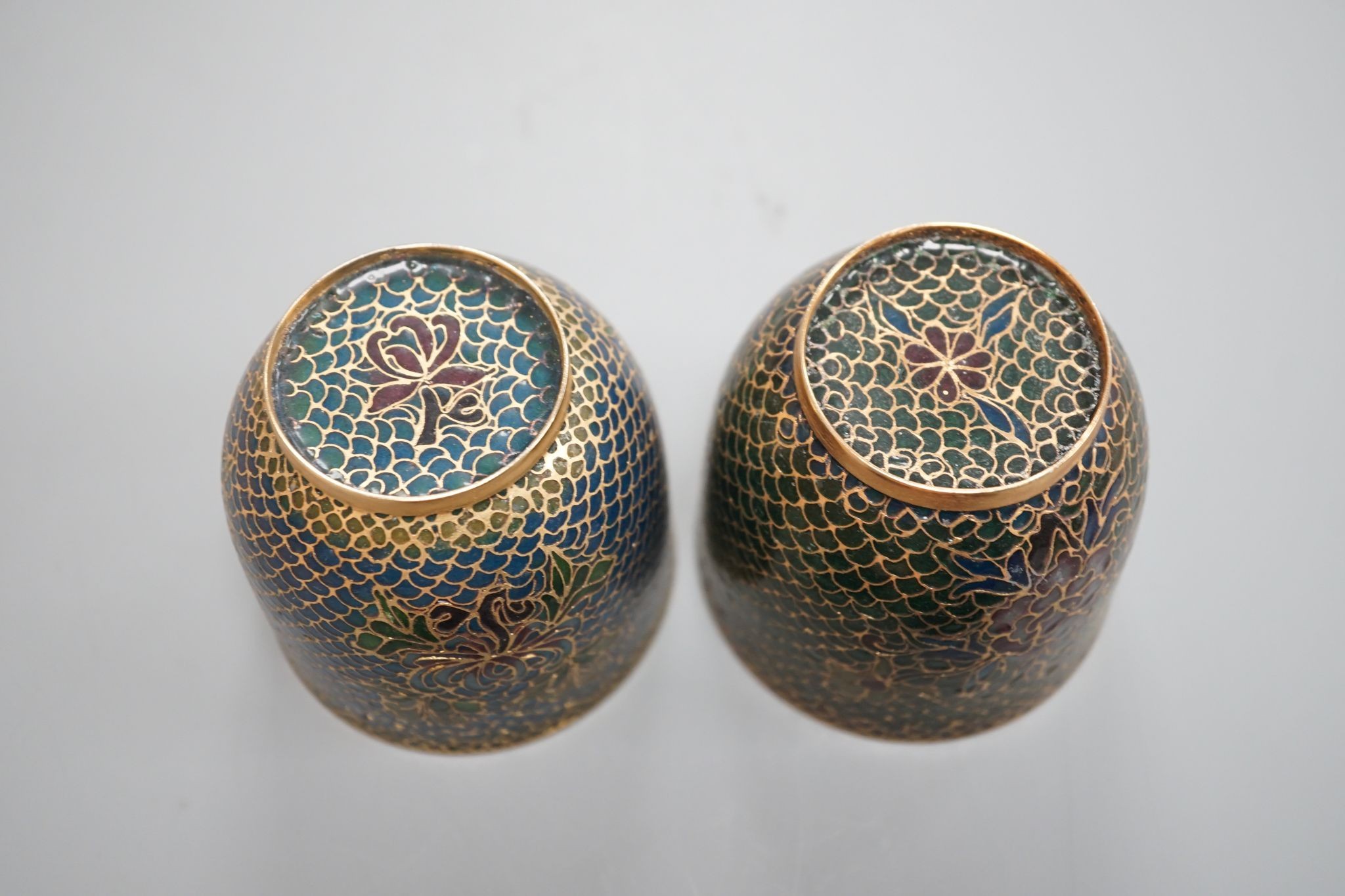 A pair of Chinese plique-a-jour cups (cased)